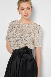 Model Genericm wearing size sample of the Ginger Sequin Top - Mink in colour Mink, in a cropped view