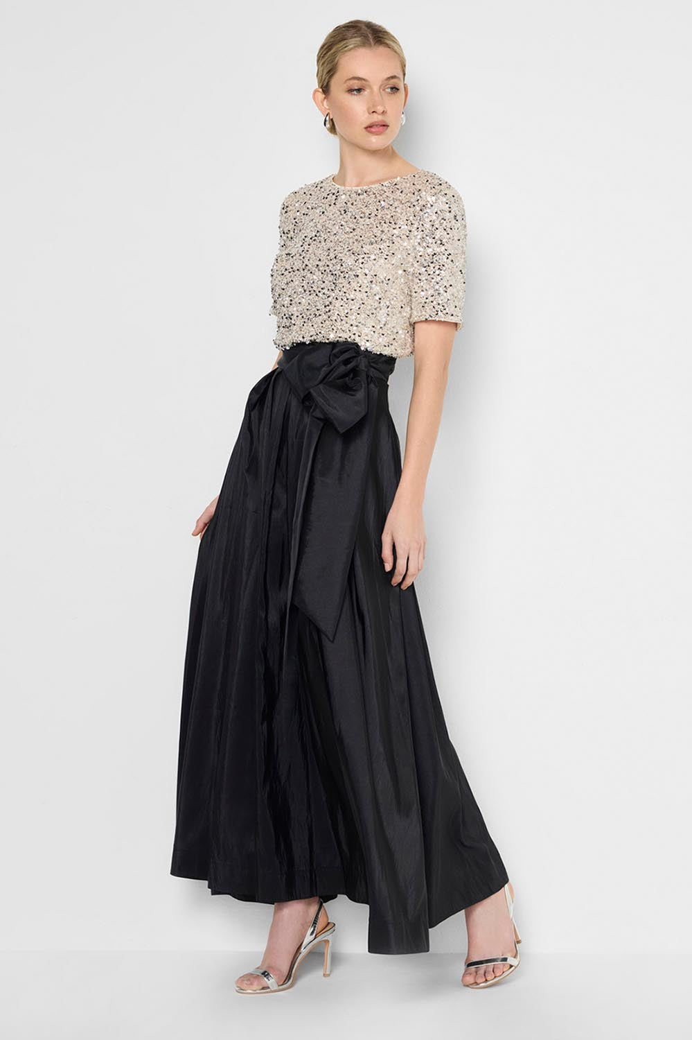 Model Genericm wearing size sample of the Ginger Sequin Top - Mink in colour Mink, from the front