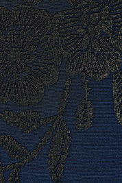 Product shot of The Printed Nadine Dress in colour Navygold (Blue), detail