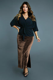 Model Laura wearing size 14 of the Kate Skirt in colour Copper (Metallics), from the front, showing the whole outfit
