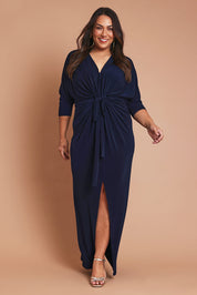 Model Ashleigh wearing size 16 of the Nadine Dress in colour NavyBlue (Blue), from the front, showing the whole outfit