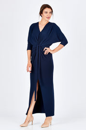 Model Rebecca wearing size 10 of the Nadine Dress in colour NavyBlue (Blue), from the front, showing the whole outfit