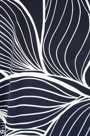 Product shot of The Printed Kelly Blouse in colour Navyleaves (Blue), detail