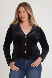 Model Chanel wearing size 10 of the Dawn Velvet Jacket in colour Black (Black), from the front, cropped image