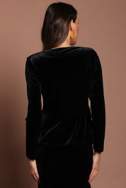 Model Madeline wearing size 10 of the Dawn Velvet Jacket in colour Black (Black), from the back