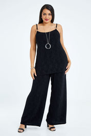Model Sasha-Lee wearing size 16 of the Donna Glamorous Top in colour Midnight (Black), from the front, showing the whole outfit