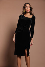 Model Madeline wearing size 10 of the Diana Velvet Dress in colour Black (Black), from the front, cropped image