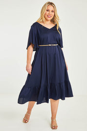 Model Katie wearing size 16 of the Mary Dress in colour Navy (Blue), from the front, showing the whole outfit