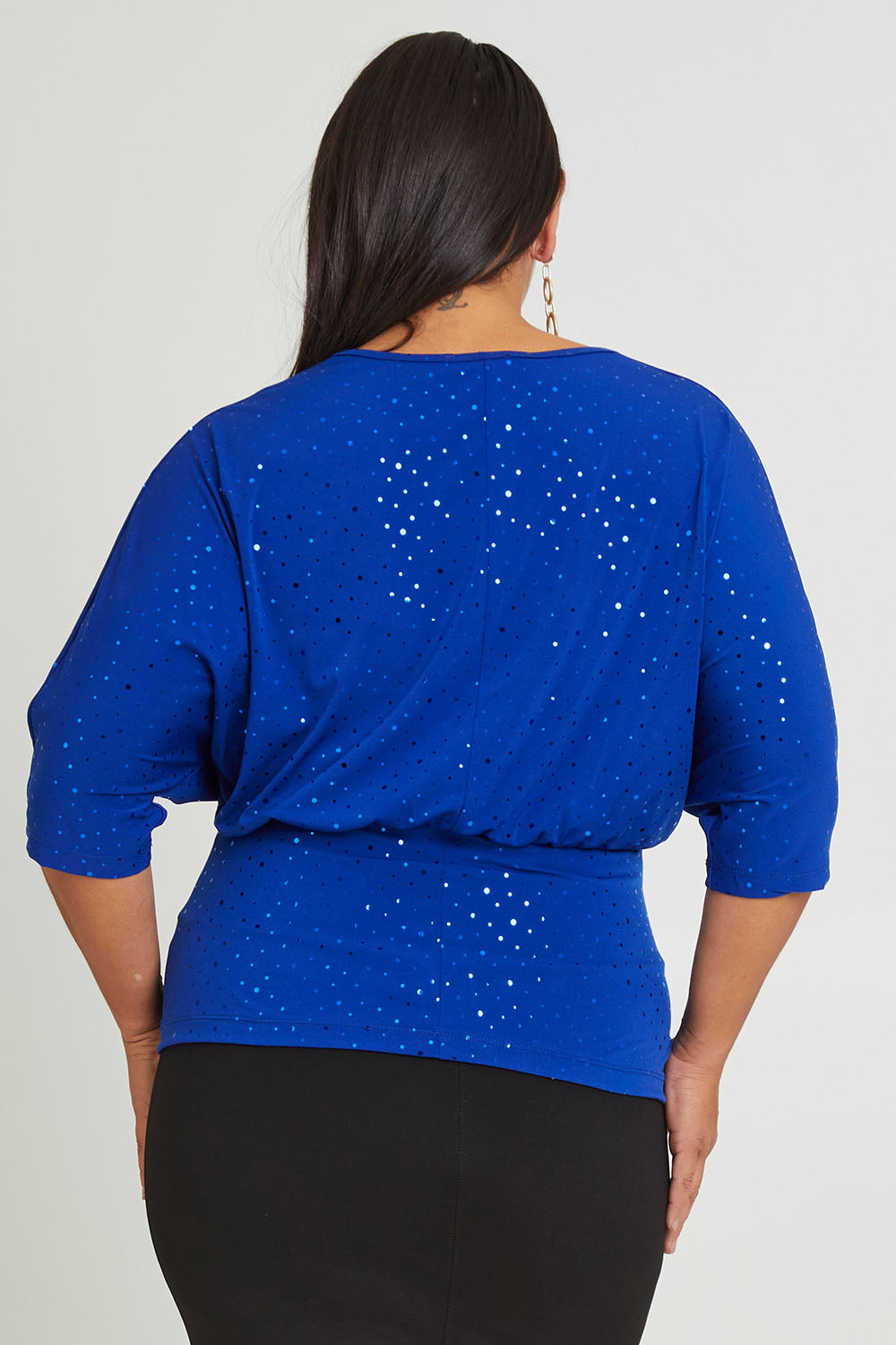 Model Ashleigh wearing size 16 of the Niamh Top in colour Cobalt (Blue), from the back