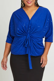 Model Ashleigh wearing size 16 of the Niamh Top in colour Cobalt (Blue), from the front, cropped image