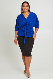 Model Ashleigh wearing size 16 of the Niamh Top in colour Cobalt (Blue), from the front, showing the whole outfit