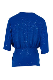 Product shot of the Niamh Top in colour Cobalt (Blue), from the back