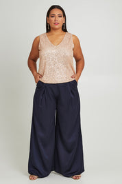 Model Ashleigh wearing size 16 of the Mandy Pants in colour Navy (Blue), from the front, showing the whole outfit