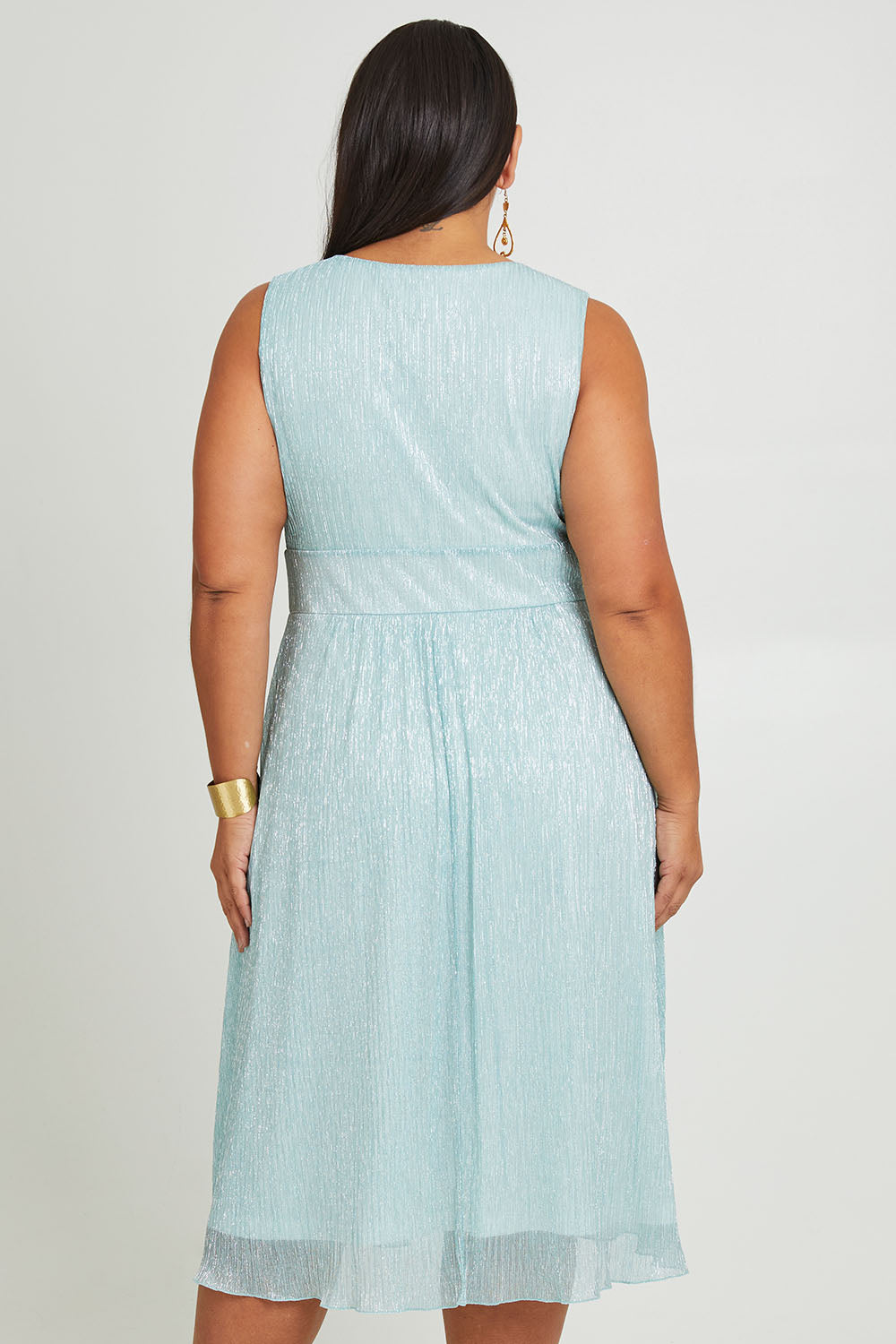Model Ashleigh wearing size 16 of the Sally Ann Dress in colour Oasis (Green), from the back