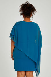 Model Alexis wearing size 16 of the Beatrice Dress in colour Teal (Blue), from the back