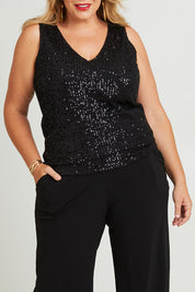Model Fiona wearing size 16 of the Reece Top in colour Black (Black), from the front, cropped image