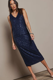 Model Amanda wearing size 10 of the Reece Top in colour Navy (Blue), from the front, showing the whole outfit
