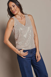 Model Amanda wearing size 10 of the Reece Top in colour Rosegold (Metallics), from the front, cropped image