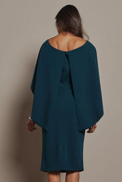 Model Amanda wearing size 10 of the Cora Dress in colour Darkteal (Green), from the back