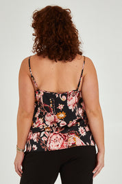 Model Maddy wearing size 16 of the Mia Top in colour Floral (Black), from the back