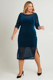 Model Fiona wearing size 16 of the Sinead Dress in colour Ocean (Blue), from the front, showing the whole outfit