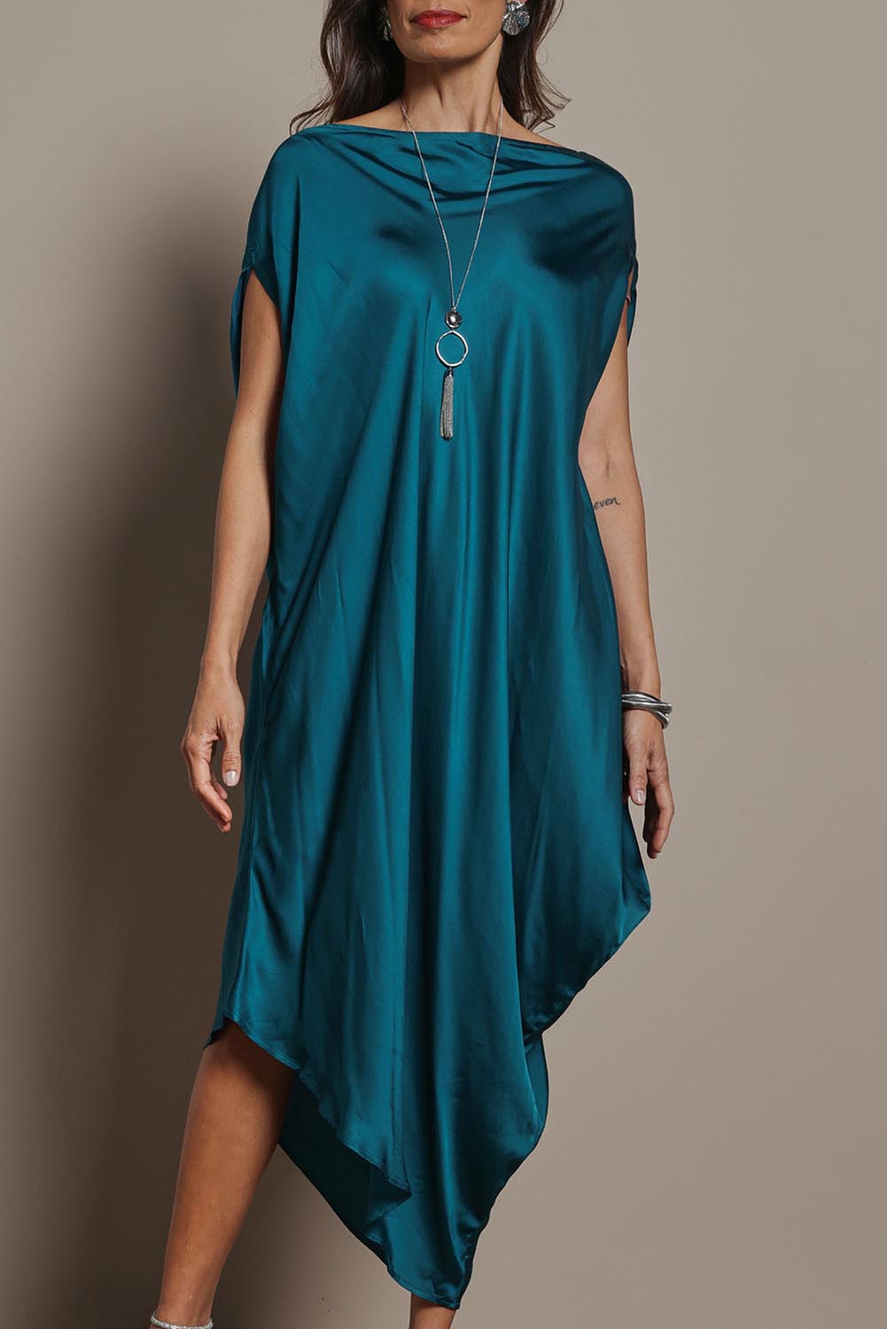 Model Amanda wearing size S of the Hayley Dress in colour Ocean (Green), from the front, cropped image