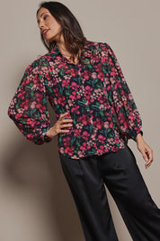 Model Amanda wearing size 10 of the Elina Blouse in colour Blossom (Pink), from the front, cropped image