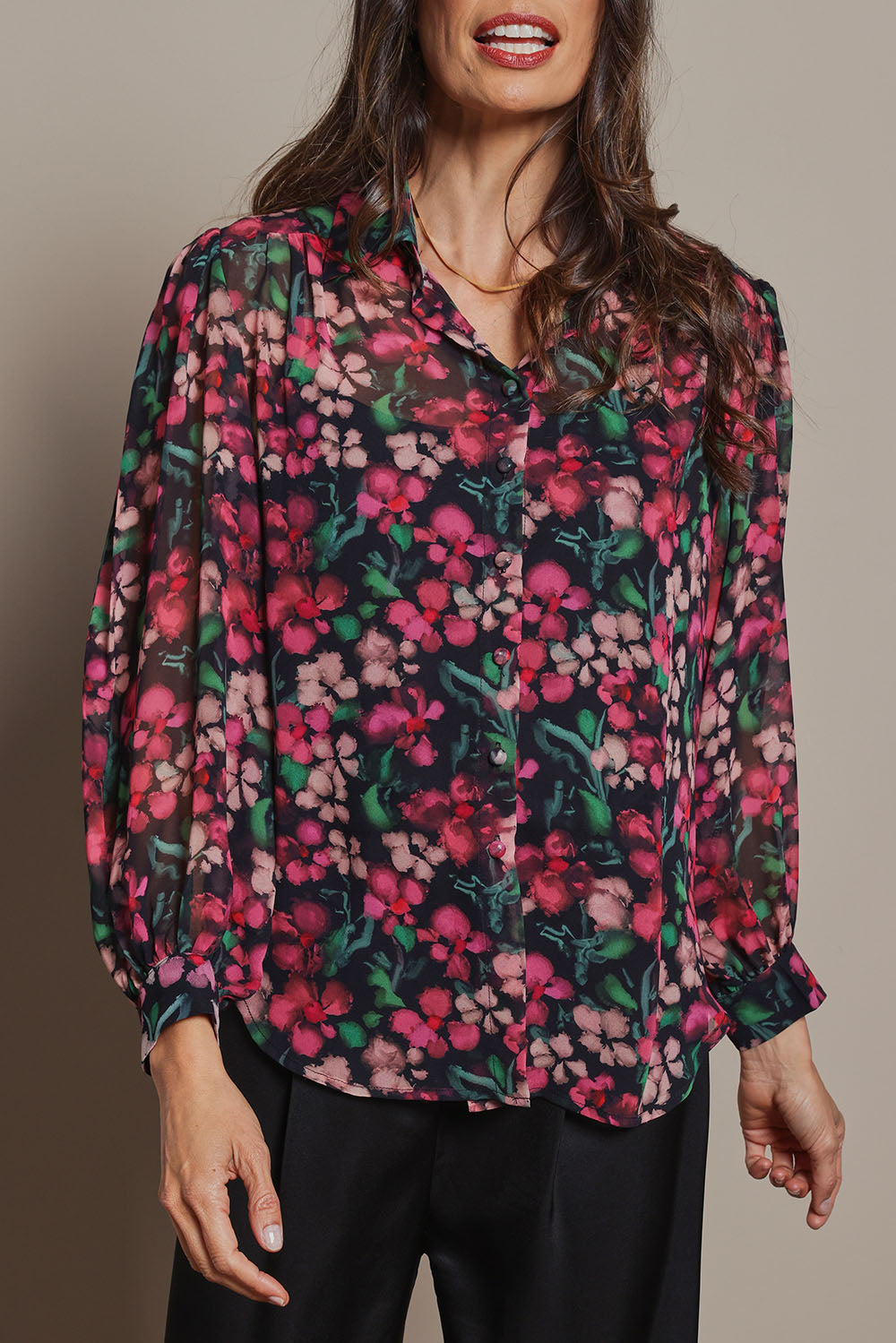 Model Amanda wearing size 10 of the Elina Blouse in colour Blossom (Pink), from the front, cropped image