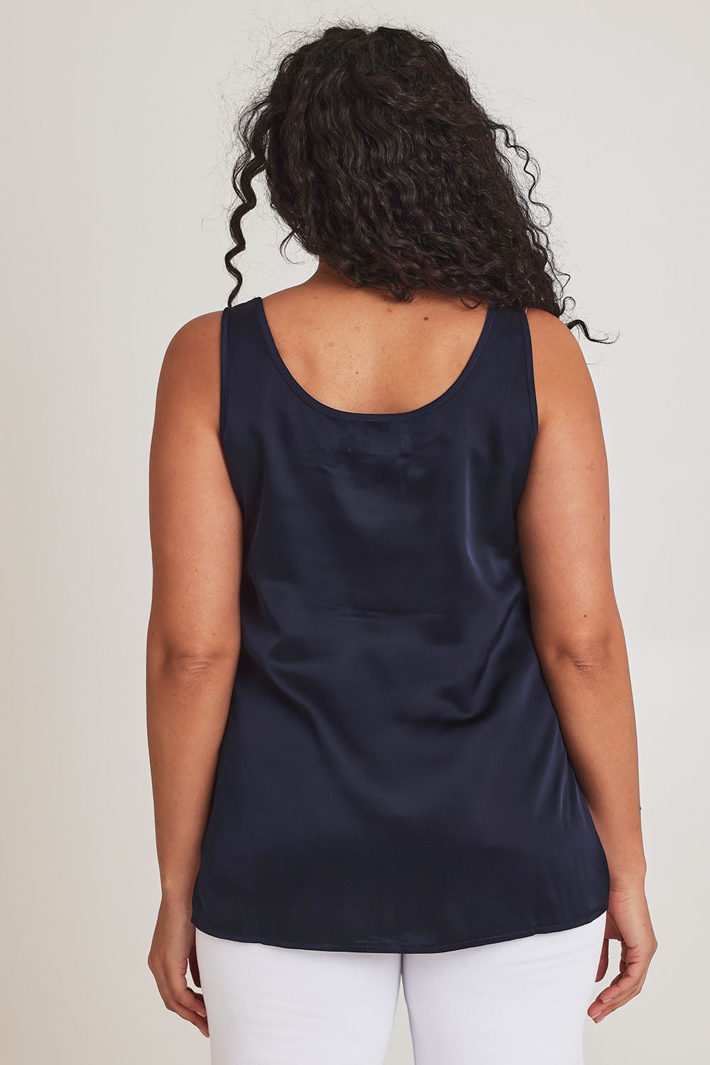 Model Terri-Leigh wearing size 14 of the Cindy Top in colour Navy (Blue), from the back