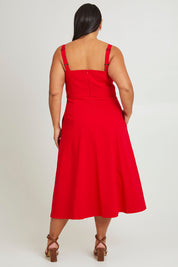 Model Ashleigh wearing size 16 of the Carmen Dress in colour Flame (Red), from the back