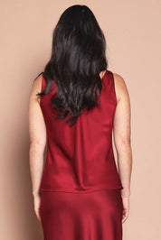 Model Katie wearing size 10 of the Loulou Satin Camisole in colour Shiraz (Red), from the back