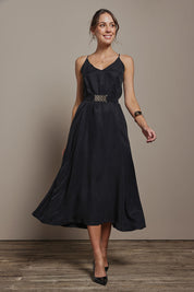Model Madeline wearing size 10 of the Edith Dress in colour Black (Black), from the front, showing the whole outfit