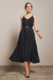 Model Madelinec wearing size 10 of the Edith Dress - Black in colour Black, from the front