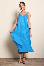 Model Maddiec wearing size 10 of the Edith Dress – Pacific in colour Pacific, from the front