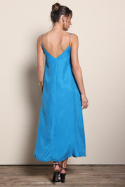 Model Maddiec wearing size 10 of the Edith Dress – Pacific in colour Pacific, from the front