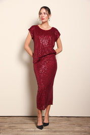 Model Maddiec wearing size 10 of the Reegan Sequin Skirt - Rouge in colour Rouge, from the front
