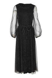 Product shot of the Lorraine Dress in colour Whitedot (Black), from the front