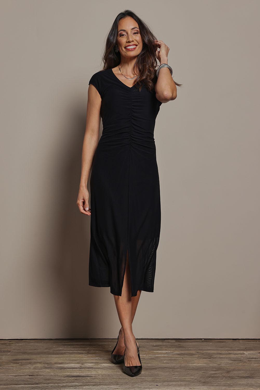 Model Amanda wearing size 10 of the Josephine Mesh Dress in colour Black (Black), from the front, showing the whole outfit