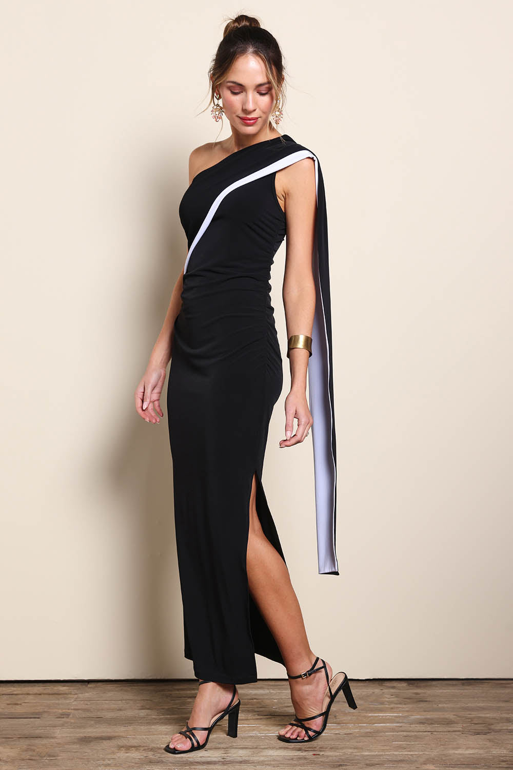Model Maddiec wearing size 10 of the Camille Reversable Dress – Black in colour Black, from the front