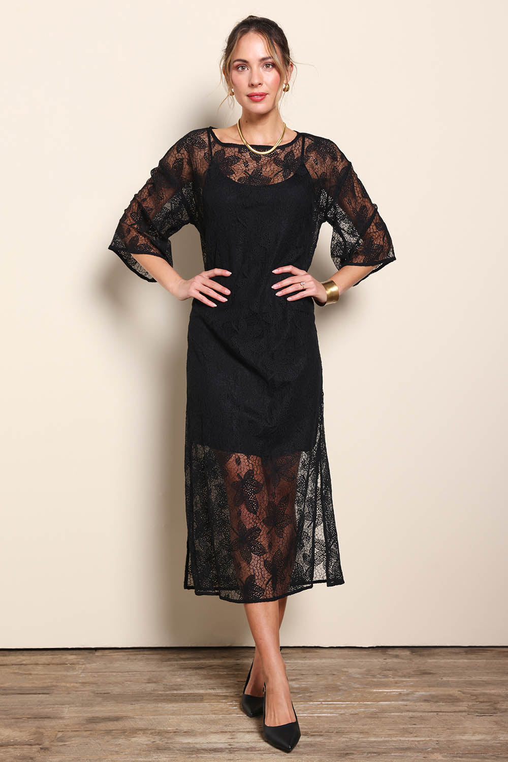 Model Maddiec wearing size 10 of the Nina Lace Dress - Black in colour Black, from the front