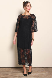 Model Maddiec wearing size 10 of the Nina Lace Dress - Black in colour Black, from the front