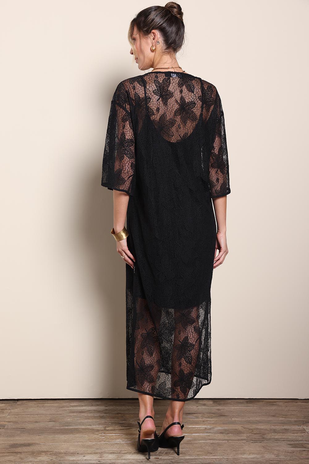 Model Maddiec wearing size 10 of the Nina Lace Dress - Black in colour Black, from the front
