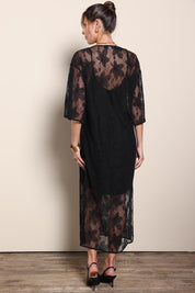 Model Maddiec wearing size 10 of the Nina Lace Dress - Black in colour Black, from the front