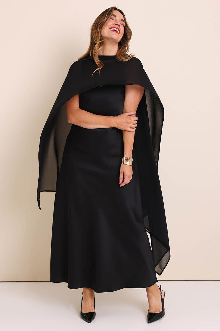 Model Lauraw wearing size 14 of the Freya Sheer Wrap – Black in colour Black, from the front