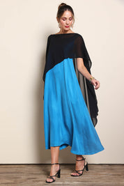 Model Maddiec wearing size 10 of the Freya Sheer Wrap – Black in colour Black, from the front