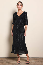 Model Maddiec wearing size 10 of the Priscilla Evening Gown – Black in colour Black, from the front
