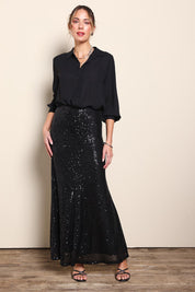 Model Maddiec wearing size 10 of the Remy Sequin Skirt – Black in colour Black, from the front