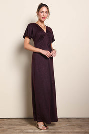 Model Maddiec wearing size 10 of the Glenda Evening Gown - Garnet in colour Garnet, from the front