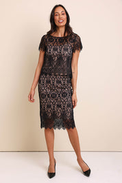 Model Amandam wearing size 10 of the Kiki Lace Top - Black in colour Black, from the front