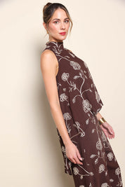 Model Maddiec wearing size 10 of the Celia Top - Chocolategold in colour Chocolategold, from an angle